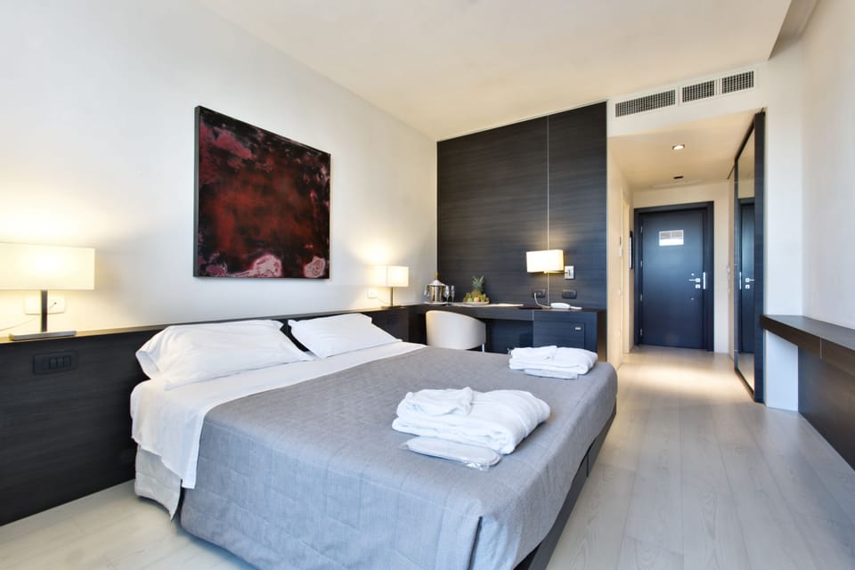 Premium bedding, memory foam beds, minibar, in-room safe