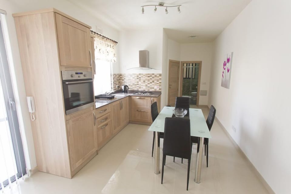 Comfort Apartment, 2 Bedrooms, Beach View | Private kitchen | Full-size fridge, microwave, oven, stovetop