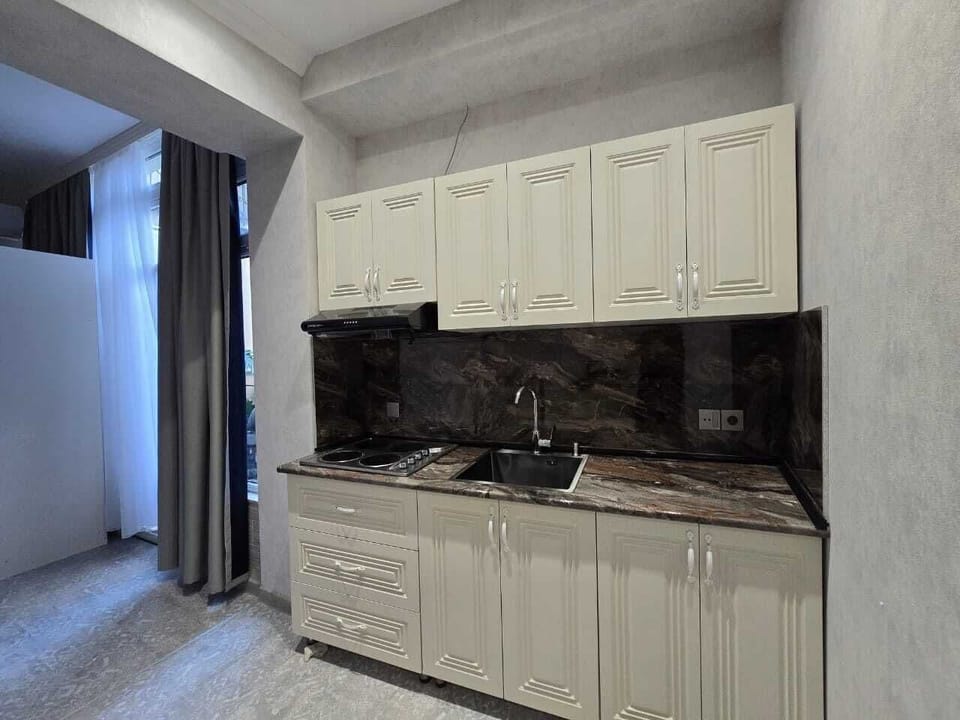 Family Room | Private kitchen | Coffee/tea maker, electric kettle