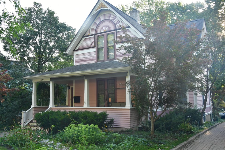The front of the house is 125 yrs old; back half added in 2000; shared driveway.