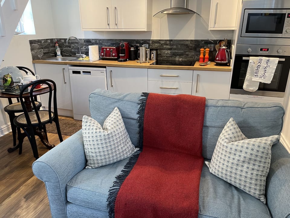 Artists' Loft Hornbeam Park | Living area | 24-inch flat-screen TV with cable channels, Smart TV, fireplace