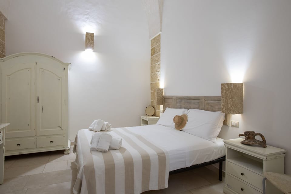 Classic Quadruple Room | Minibar, in-room safe, desk, bed sheets