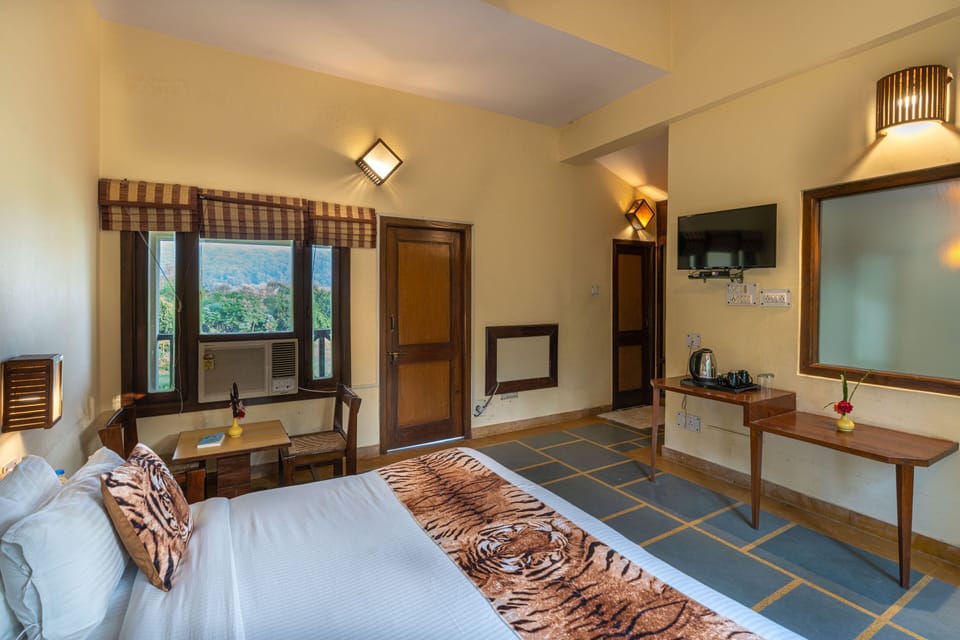 Premium Room, River View | 4 bedrooms, individually furnished, desk, blackout drapes