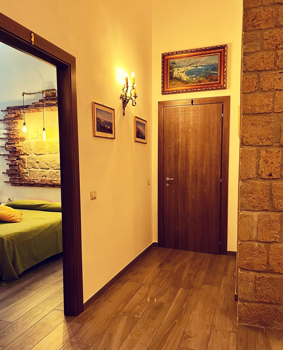 Luxury Triple Room, Ensuite, Mountainside | Living area | Flat-screen TV