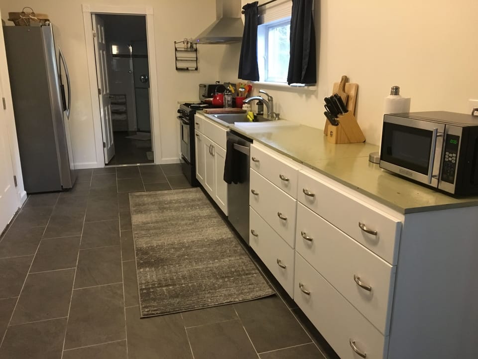 kitchen, dishwasher, refrigerator, stove,, microwave, toaster oven