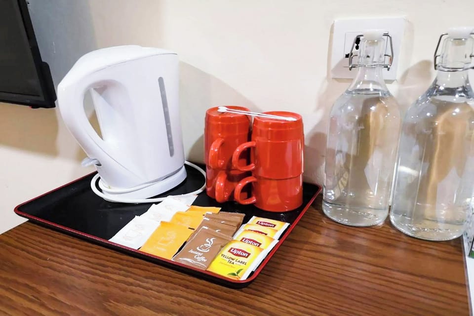 Deluxe Twin | Desk, blackout drapes, iron/ironing board, free WiFi