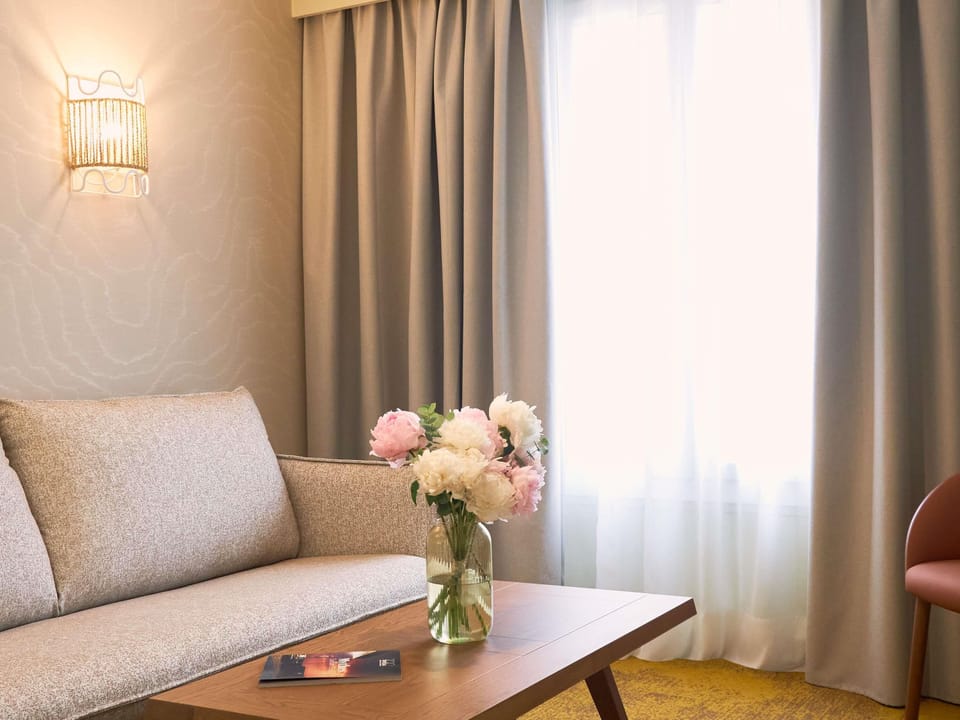 Suite, 1 Double Bed with Sofa bed | In-room safe, desk, blackout drapes, soundproofing