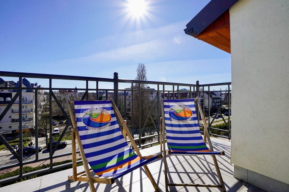 Deluxe Apartment, Multiple Beds, Partial Sea View | Balcony