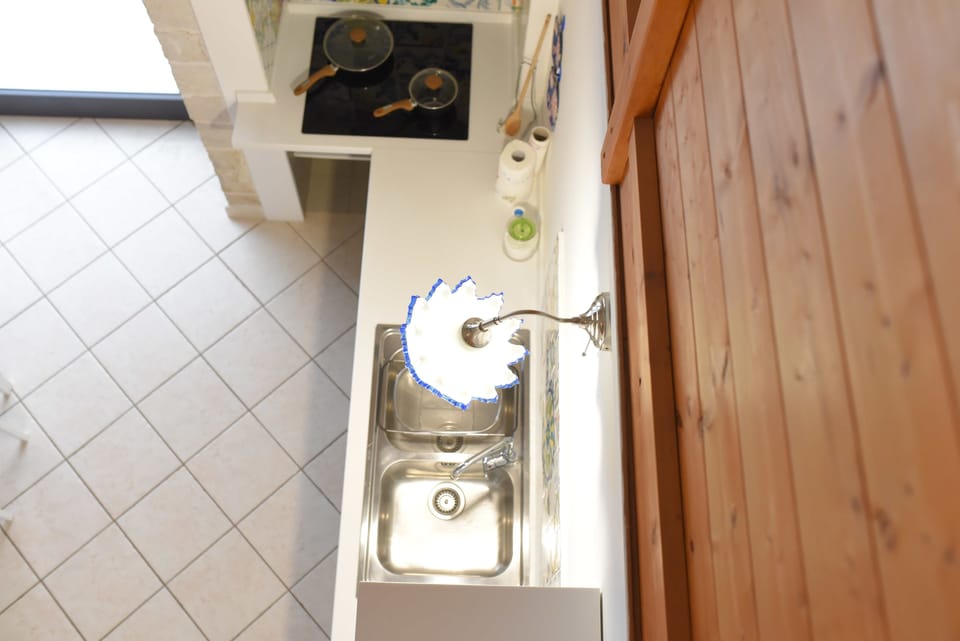 Apartment, 1 Bedroom | Private kitchenette | Fridge, stovetop, coffee/tea maker, electric kettle