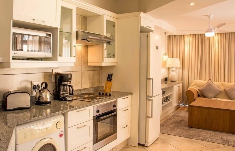 Executive Apartment, 3 Bedrooms | Private kitchen | Fridge, microwave, oven, stovetop