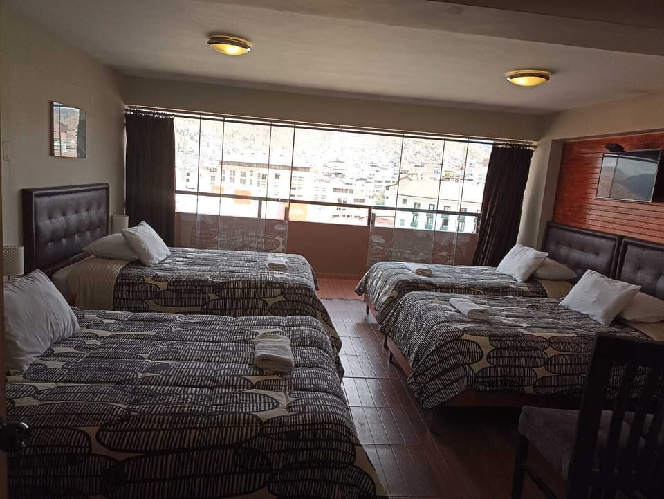 Quadruple Room, Multiple Beds | 1 bedroom, in-room safe, free WiFi, bed sheets