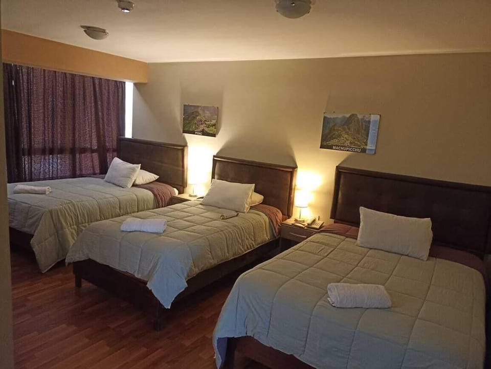 Triple Room, Multiple Beds | 1 bedroom, in-room safe, free WiFi, bed sheets