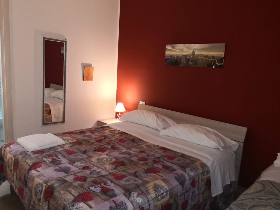 Deluxe Quadruple Room, Pool View | Premium bedding, individually decorated, individually furnished, desk