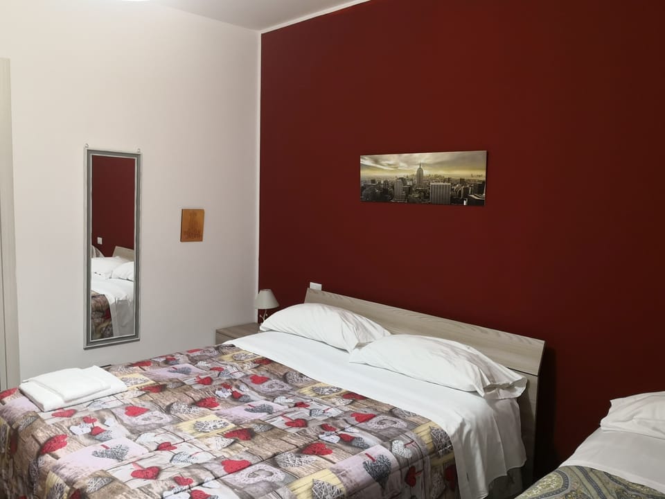 Deluxe Quadruple Room, Pool View | Premium bedding, individually decorated, individually furnished, desk