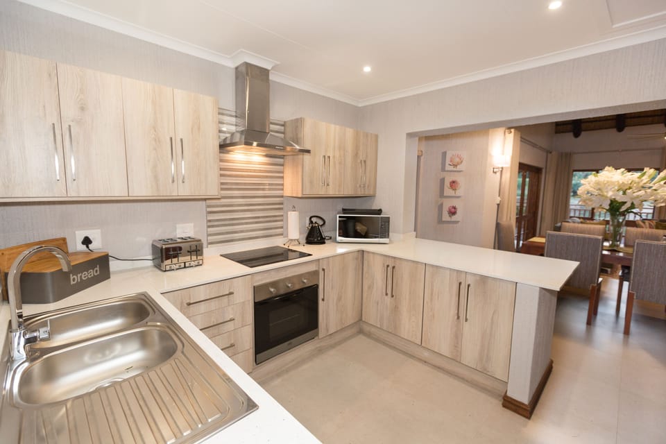 Family Chalet, Multiple Beds | Private kitchen | Full-size fridge, microwave, oven, stovetop