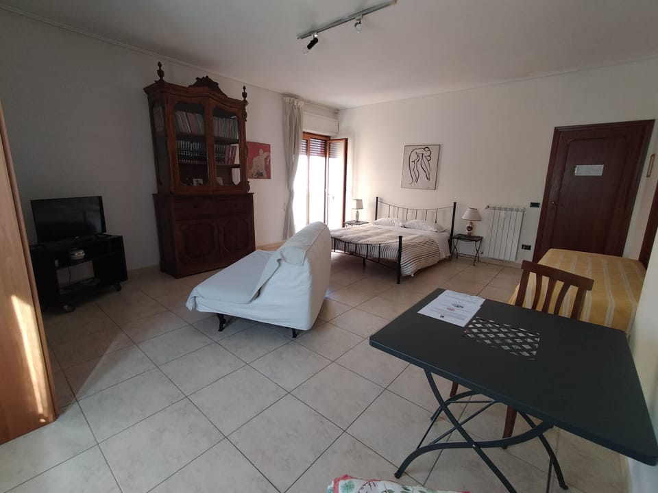 Family Room, Private Bathroom (External) | Down comforters, desk, laptop workspace, iron/ironing board