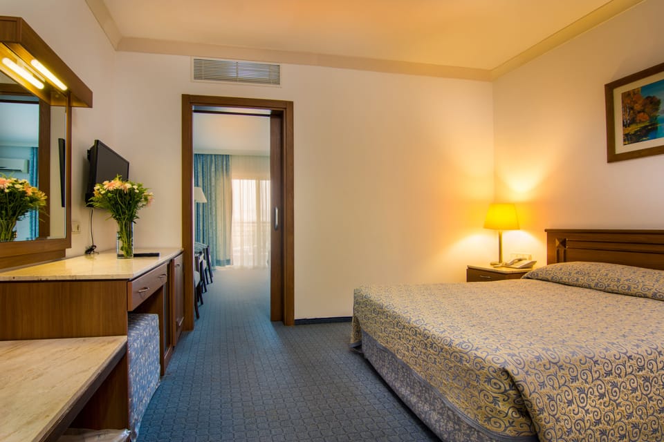 Family Room | Desk, bed sheets