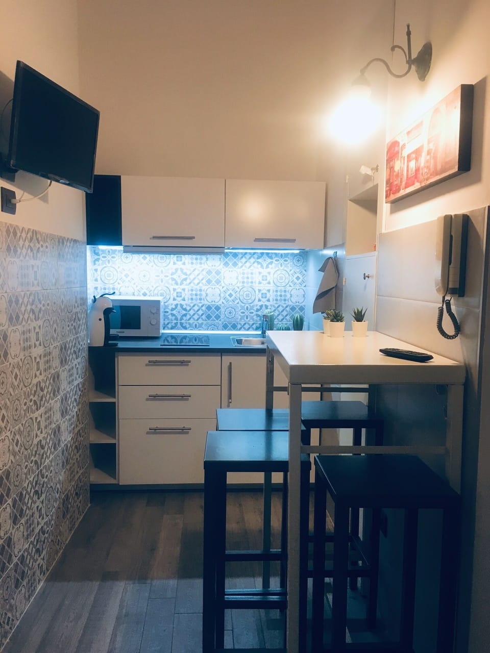 Full-size fridge, microwave, stovetop, espresso maker