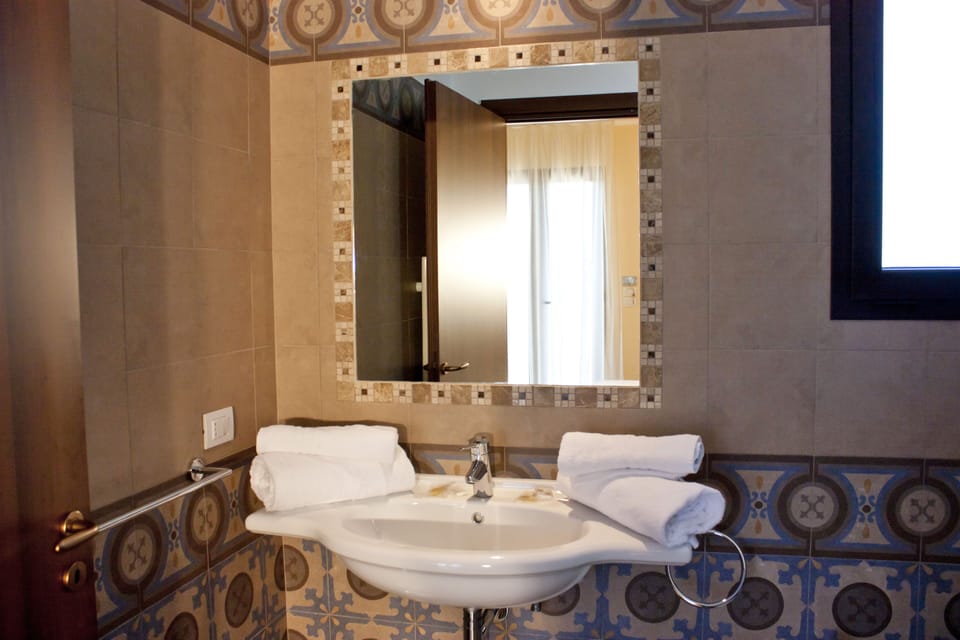 Standard Double Room | Bathroom | Shower, rainfall showerhead, bathrobes, bidet