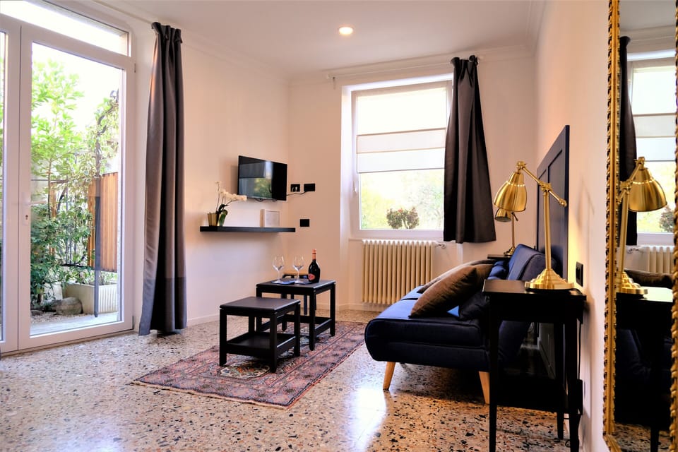 Room, 1 Suite | Down comforters, minibar, blackout drapes, free WiFi