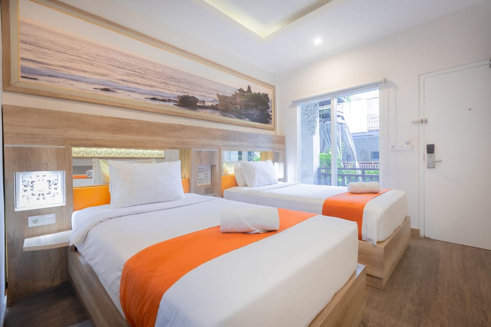 DeluxeTwin Room | Minibar, desk, blackout drapes, free WiFi