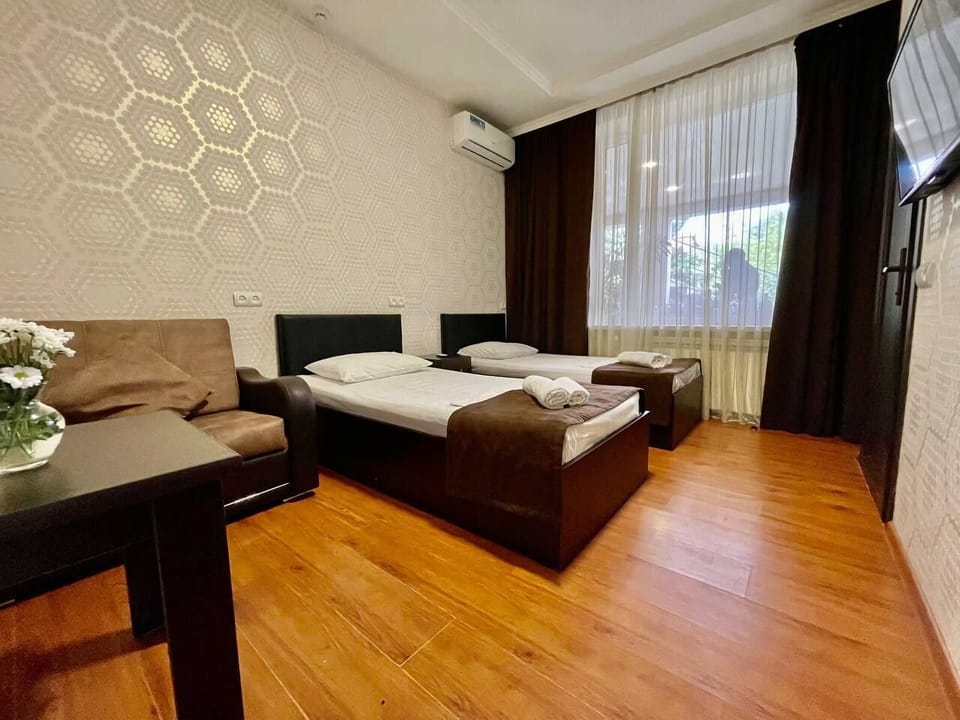 Comfort Twin Room | Blackout drapes, iron/ironing board, free WiFi, bed sheets