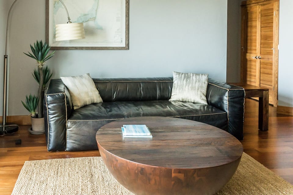 Leather Furniture with Teak Flooring 