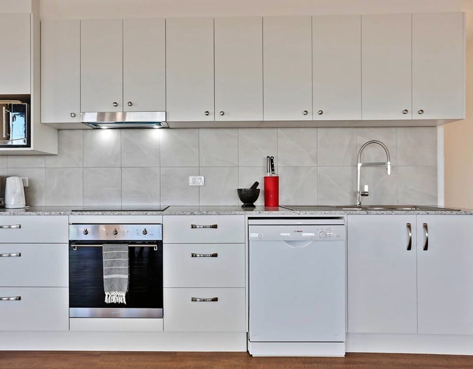 Electric stove top and oven, dishwasher, coffee machine and large fridge freezer