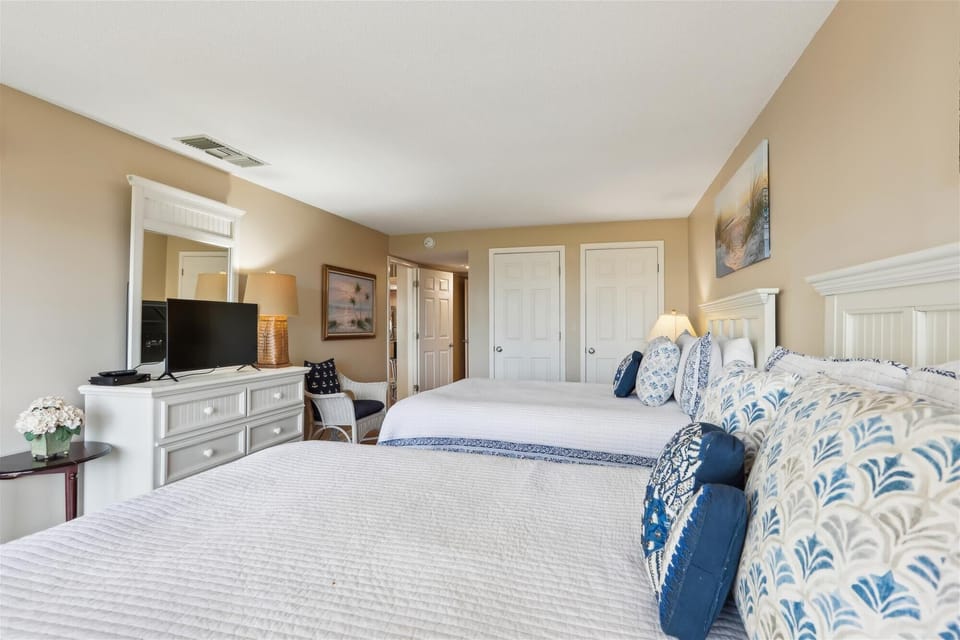 Guest Bedroom with Cable TV at 1887 Beachside Tennis