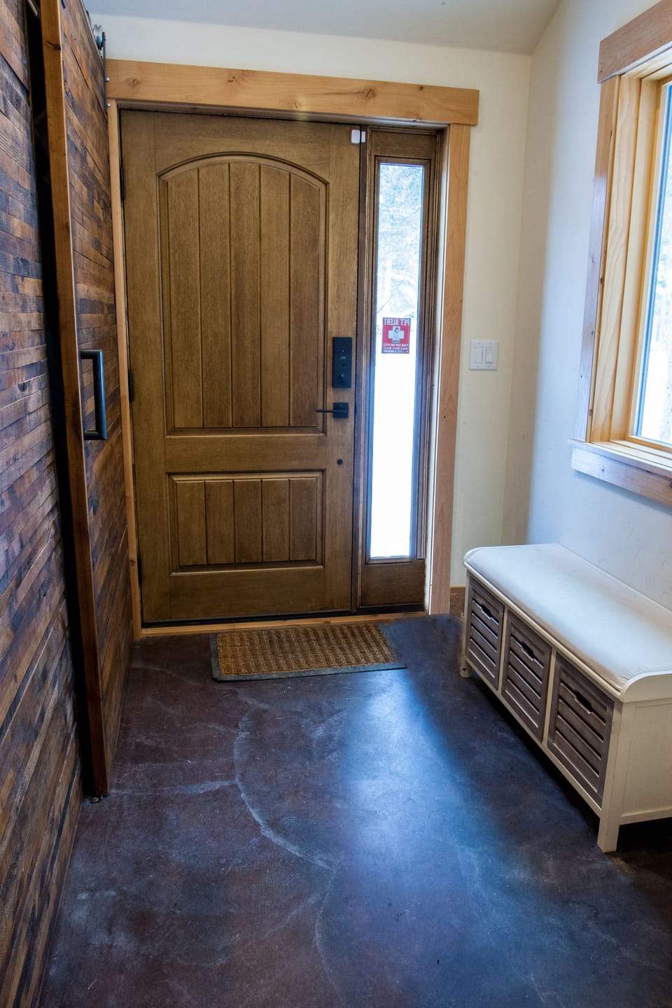 Mud room accessed by the front door keeps the snow and mud out of the house