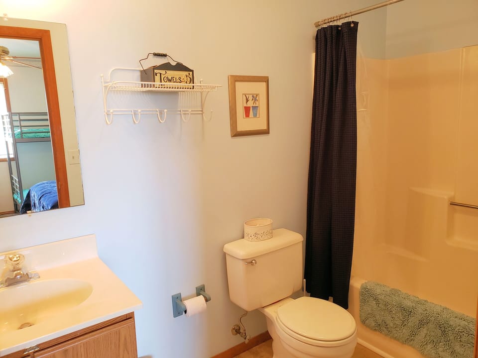 Shower/Tub Combo. Attached to Queen and Bunk Bedroom