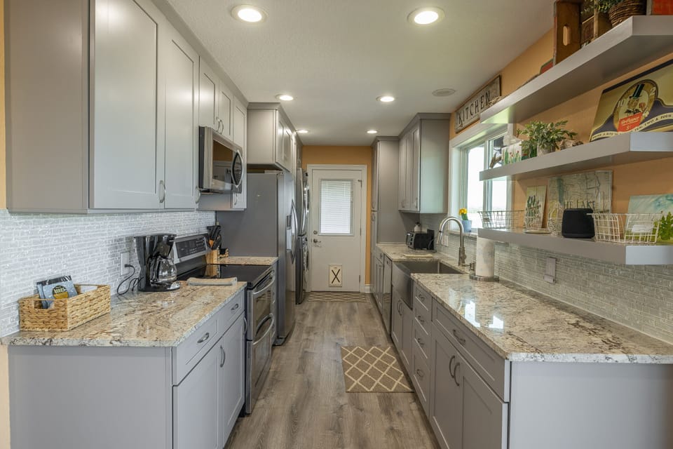 Modern kitchen equipped with all cooking and dining essentials