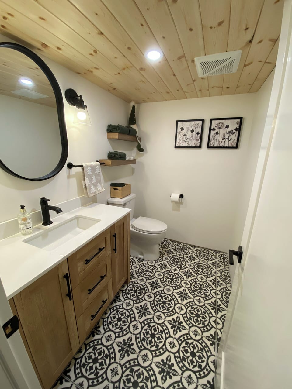 Lovely half bath ensuite accessible from bedroom.