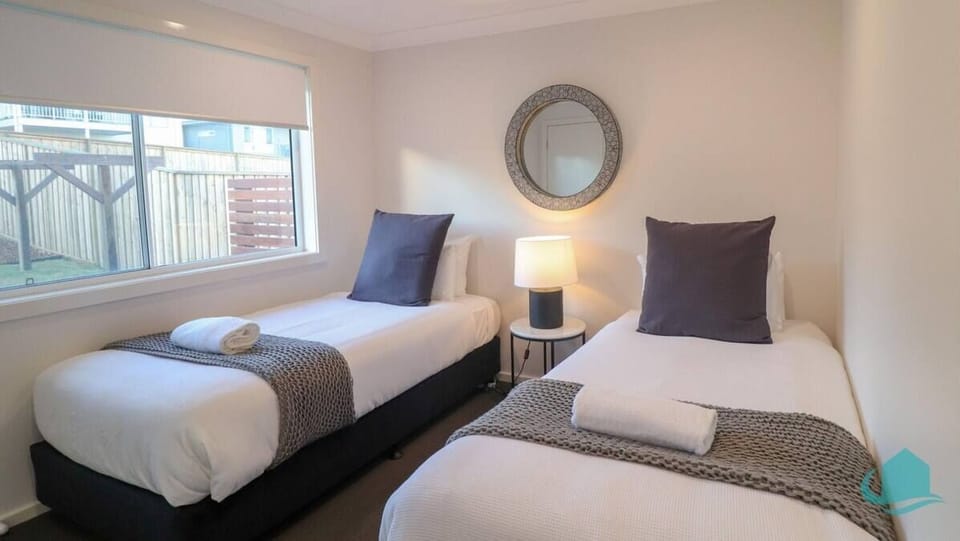 Two singles in fourth bedroom