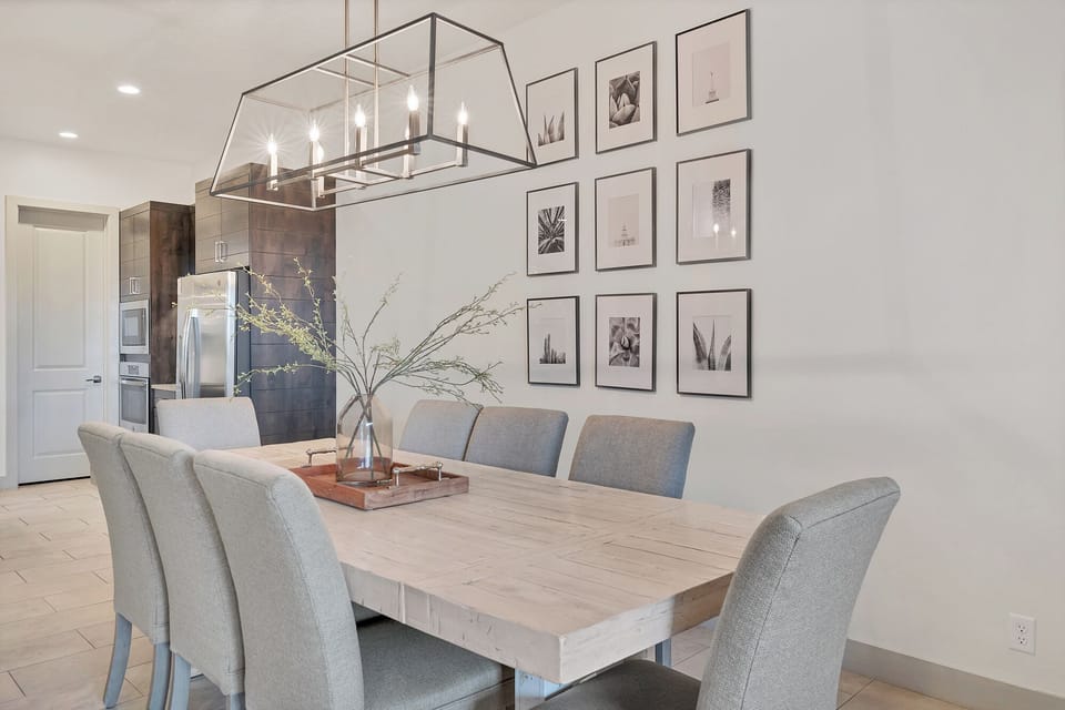 8-person dining table off the kitchen area
