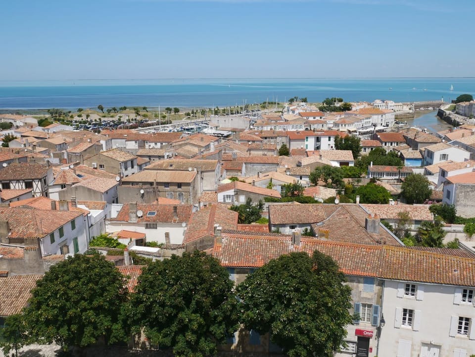 An aerial view of the pristine sandy shores and turquoise waters at Les Portes-en-Ré, at the northern tip of Île de Ré.