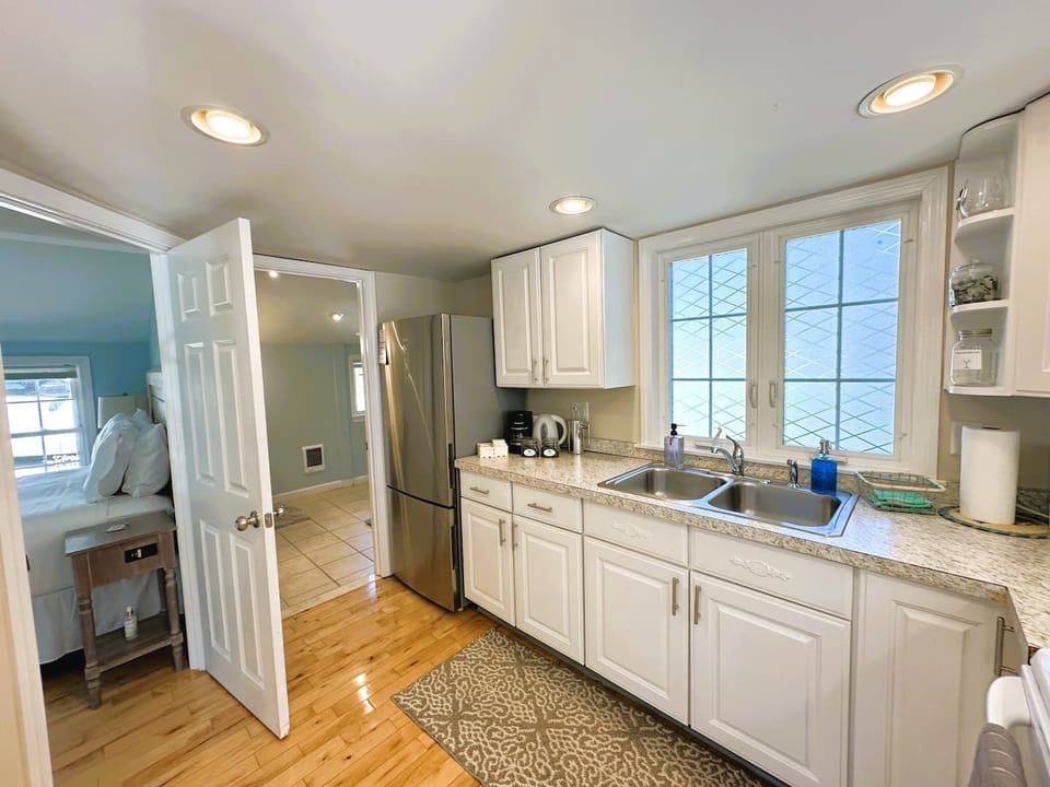 Bedroom and bathroom off kitchen