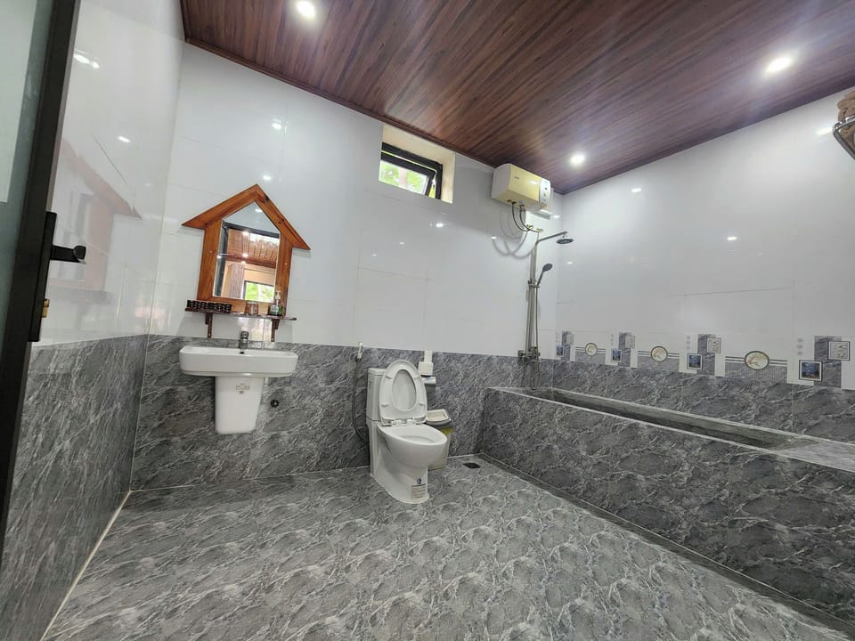 Bungalow - Water Front | Bathroom | Shower, free toiletries, hair dryer, slippers