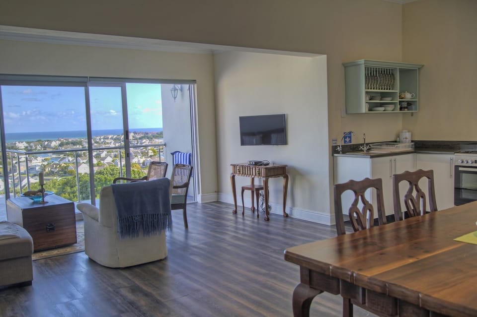 Luxury Suite 5 | Living area | 65-cm TV with cable channels