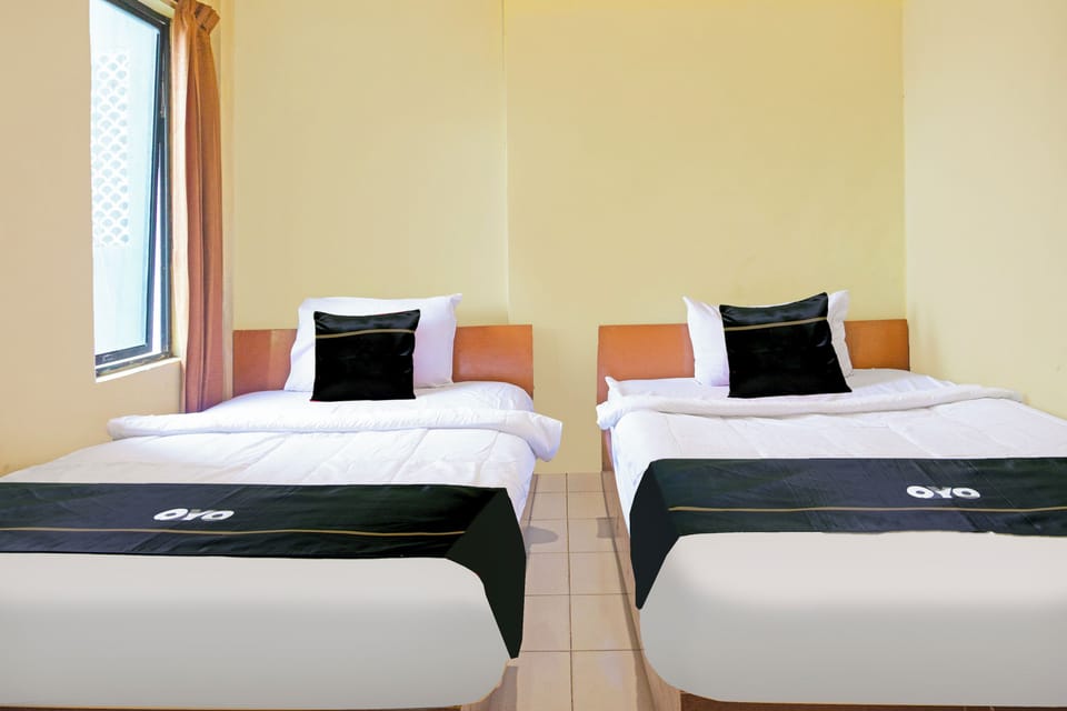 Standard Twin Room | 1 bedroom, desk, WiFi (free), bed sheets