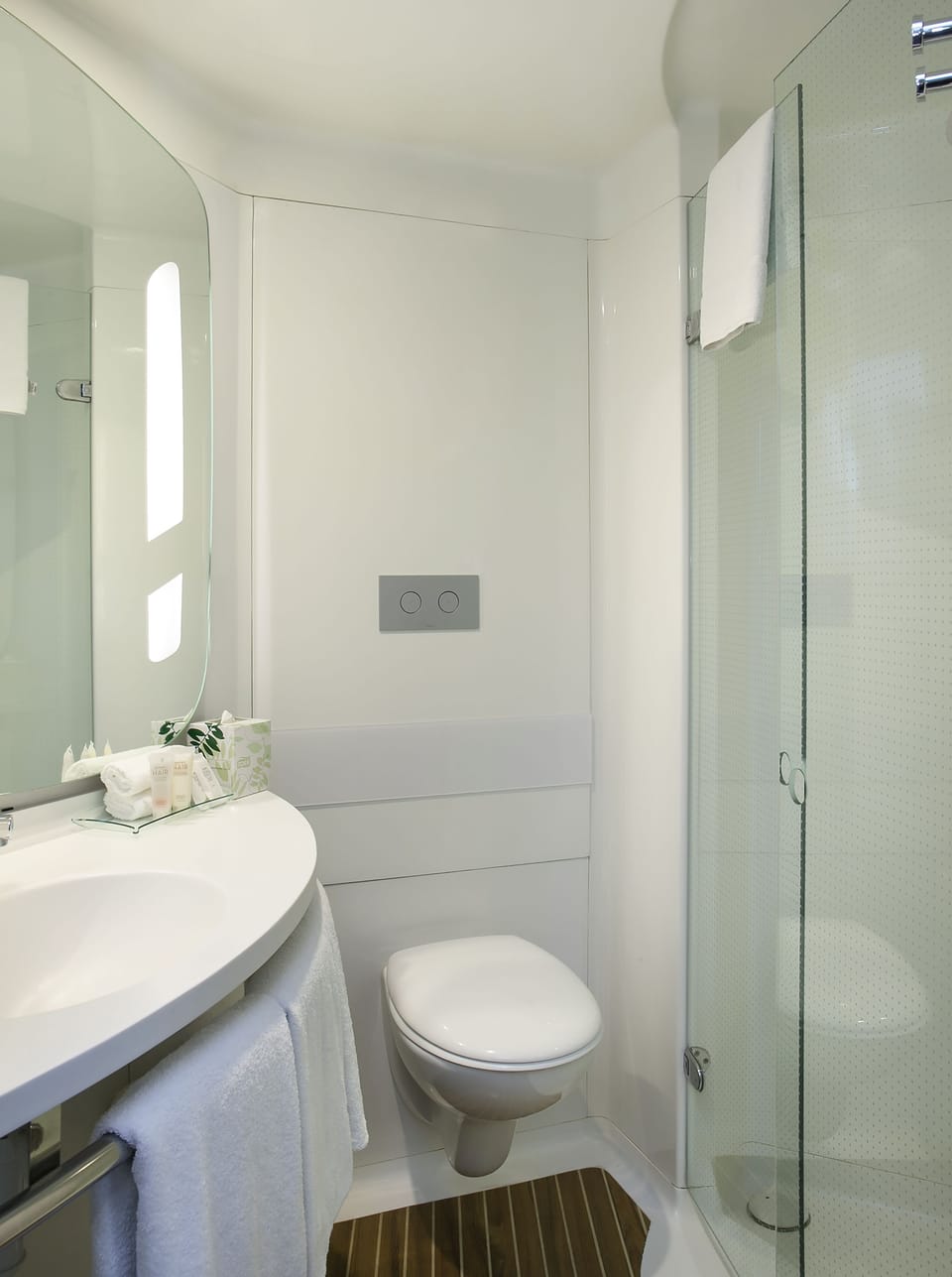 Shower, eco-friendly toiletries, hair dryer, towels