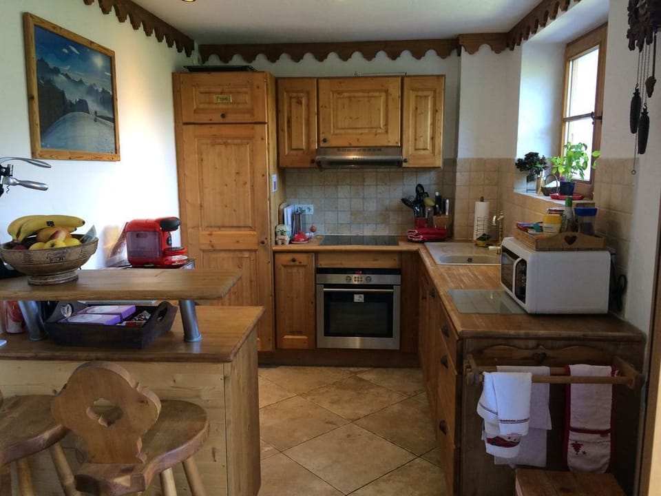 kitchen equipped with 4 ring hob oven microwave, fridge freeze, dishwasher.