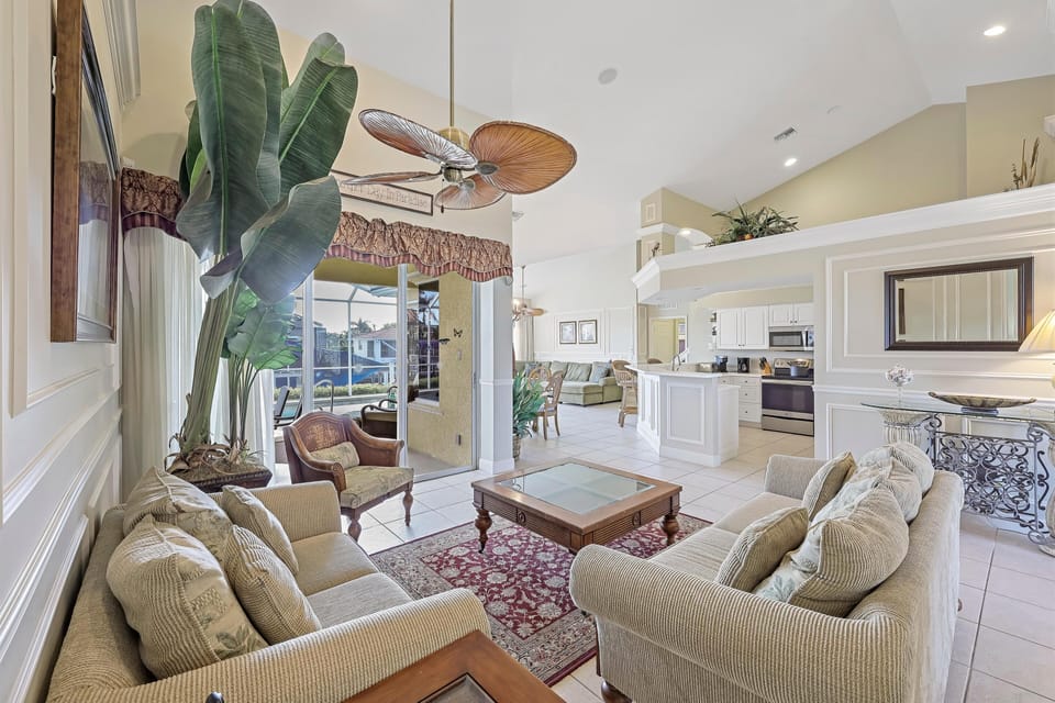 House, Multiple Beds (Large waterfront home with all-day su) | Living area | Flat-screen TV