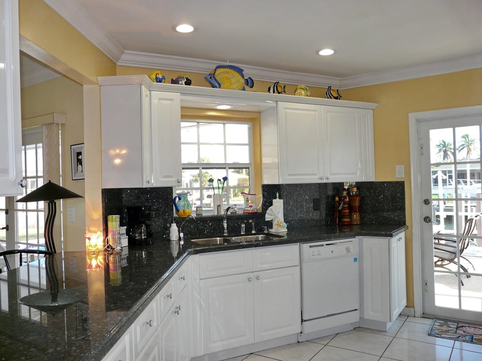 House, Multiple Beds (Pet-friendly home with pool and dock ) | Private kitchen | Fridge, microwave, oven, stovetop
