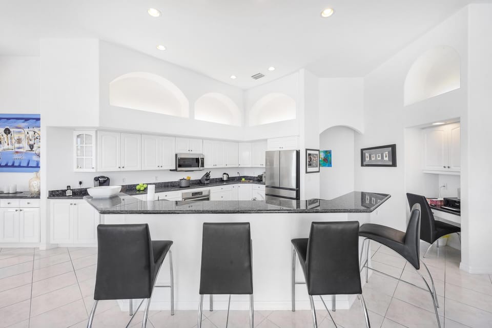 House, Multiple Beds (Waterfront home on key lot with pool,) | Private kitchen | Fridge, microwave, oven, stovetop