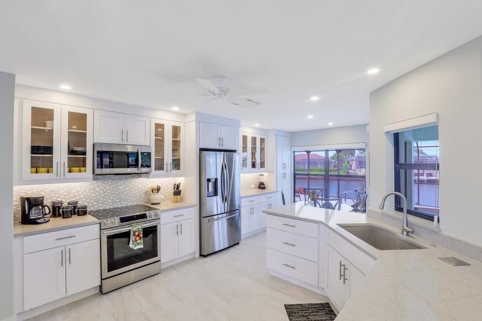 House, Multiple Beds (Pet-friendly waterfront home on key l) | Private kitchen | Fridge, microwave, oven, stovetop