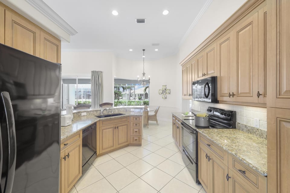 House, Multiple Beds (Pet-friendly waterfront home near bea) | Private kitchen | Fridge, microwave, oven, stovetop