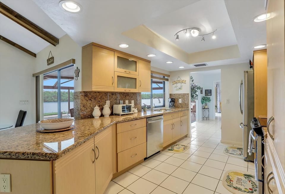 House, Multiple Beds (Waterfront home on key lot with pool/) | Private kitchen | Oven, toaster