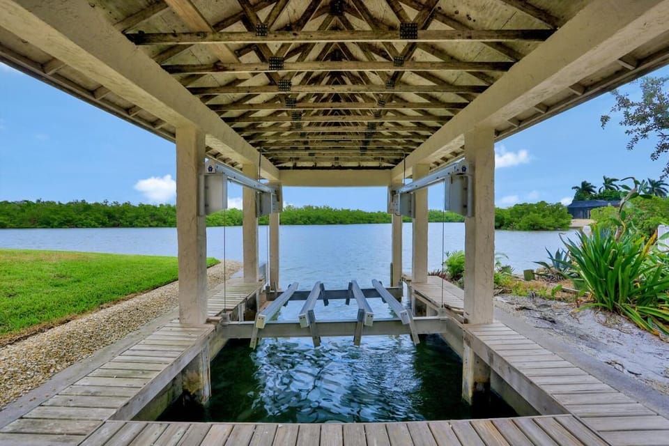 House, Multiple Beds (Waterfront home on key lot with pool/) | View from property