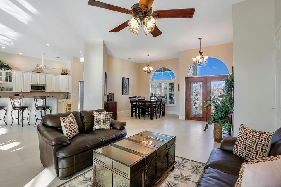 House, Multiple Beds (Waterfront home with pool, spa and wa) | Living area | Flat-screen TV